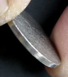 2005-Jefferson-Nickel-Struck-Through-Grease?