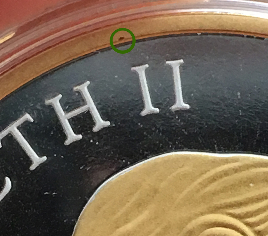 Is-It-Normal-To-See-Spot-Over-Gold-Plating-On-Coins?