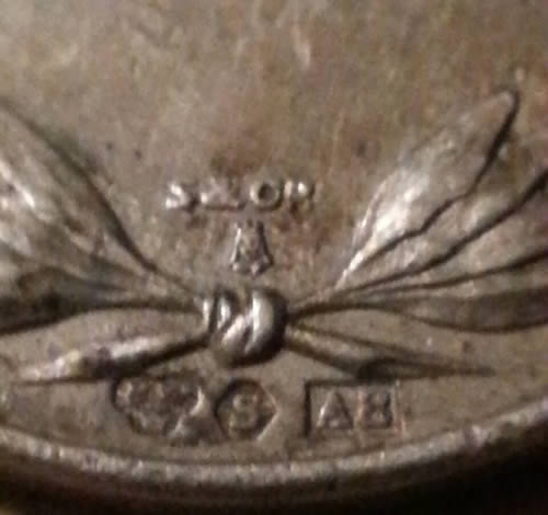 Counter-Stamp-On-Medal