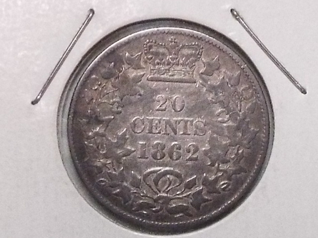 New-Brunswick-20-Cents-With-Strongly-Repunched-8.--Some-Help-Here?