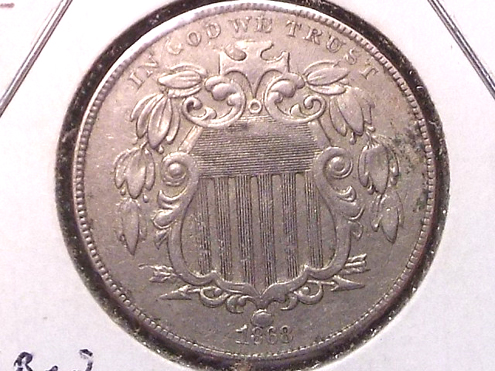 Unlisted-1868-Nickel-Repun.-Date,-Lower-Shield,-Feathers,-Arrows-Doubled