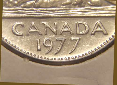 1977-Nickel.--One-7-High,-The-Other-Low.--Is-This-Usual?