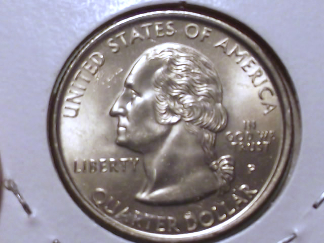 1999-25-Cents,-Horse-With-Reins-And-Horse-Without-Reins-Or-Pommel-.