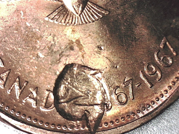 1967-Cent-Struck-Through-Struck-Fragment