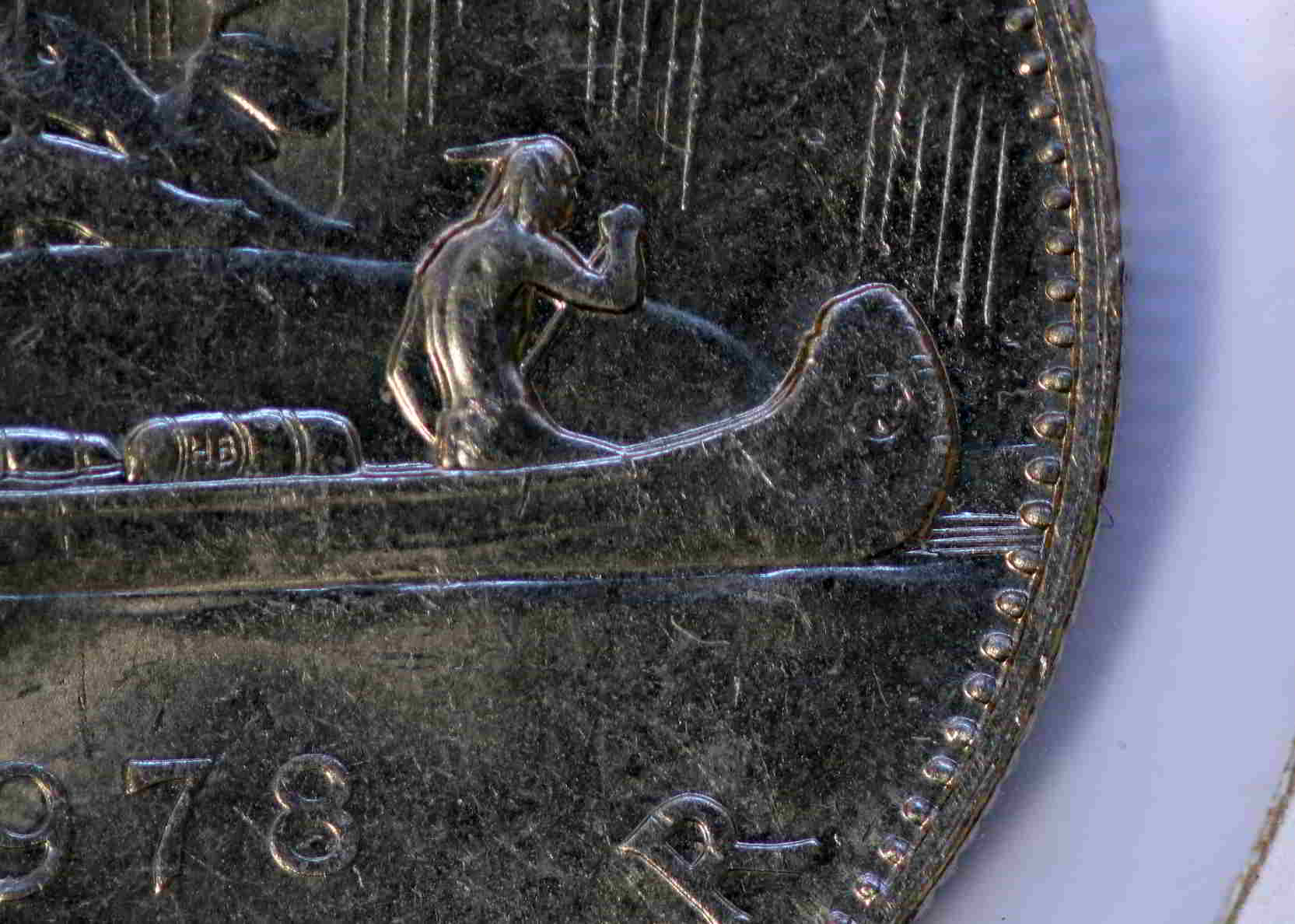 1978-Broken-Water-Line-Dollar-With-Clip